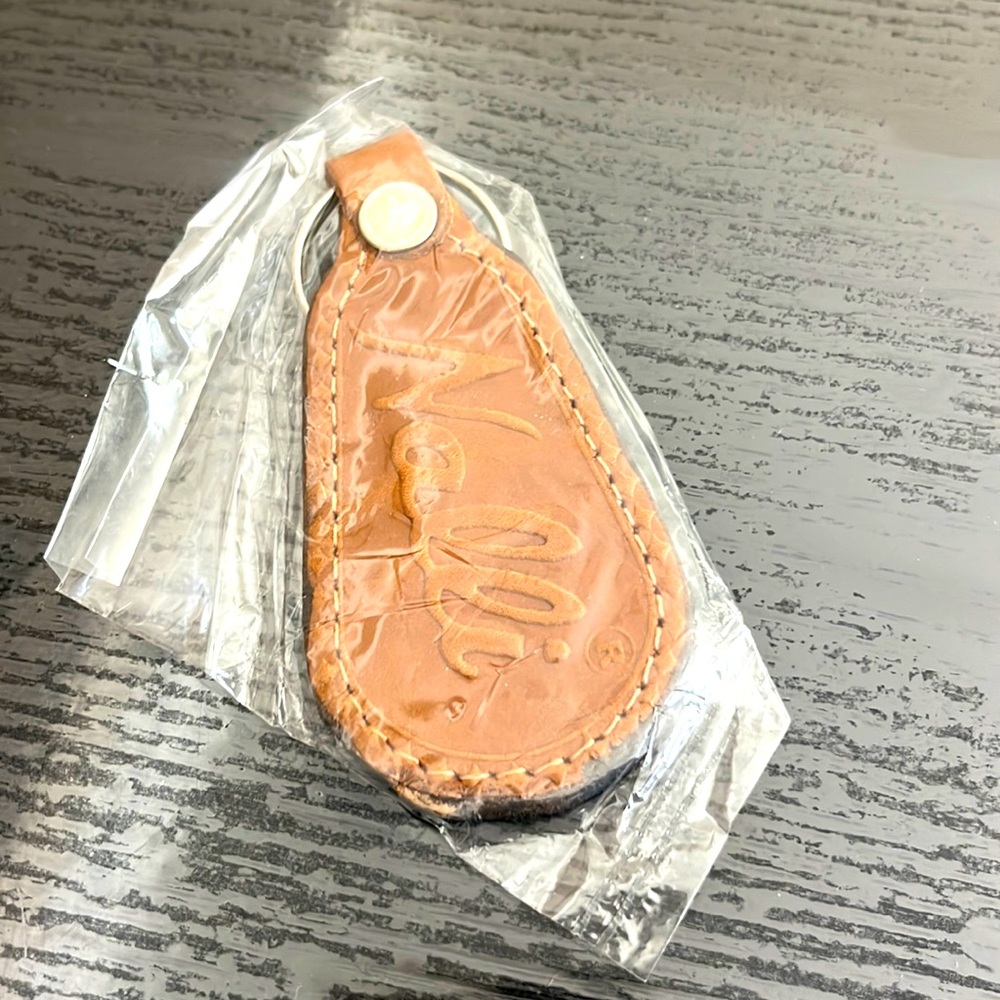 Leather keychain. NWOT.  Offers welcome!